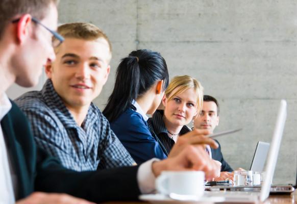 A group of students in a meeting 