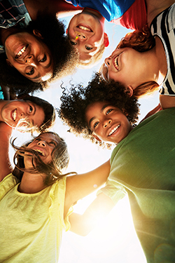 Group of young people in a huddle