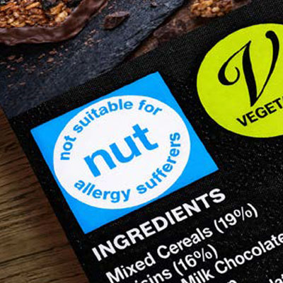 Food packaging showing ingredients and allergy information.